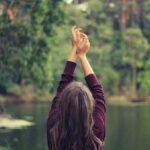 Belted outerwear with jeans